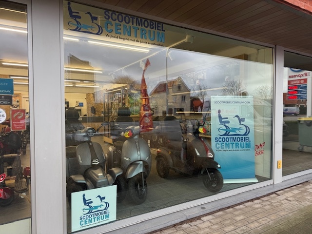 voorkant van scootmobiel centrum in België